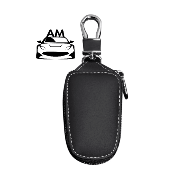 Stylish car key case cover shell in black leather with a metal keychain and zipper.