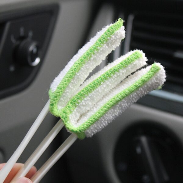 Exotic long car cleaning brush with unique design.