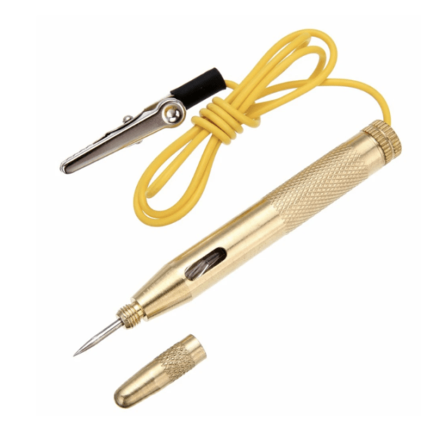 A close-up view of a gold circuit tester with sharp probes. continuity circuit tester