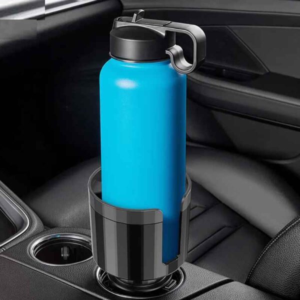 https://automods.com.au/wp-content/uploads/2023/10/Car-Cup-Holder-Expander-With-Adjustable-Base-with-bottle-scaled.jpeg