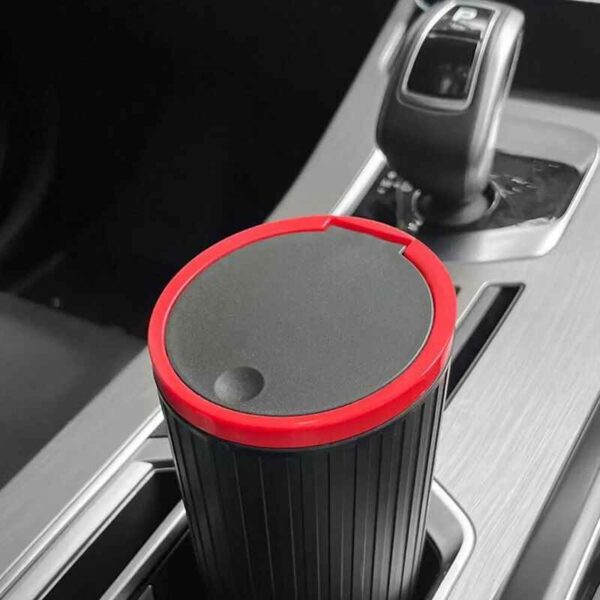 https://automods.com.au/wp-content/uploads/2023/10/Mini-Car-Trash-Bin-With-Lid-Universal-Mini-Trash-Can-For-Car-in-cup-h-scaled.jpeg
